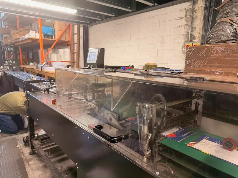 A team member hand-finishing a pack at our Dublin 3 facility